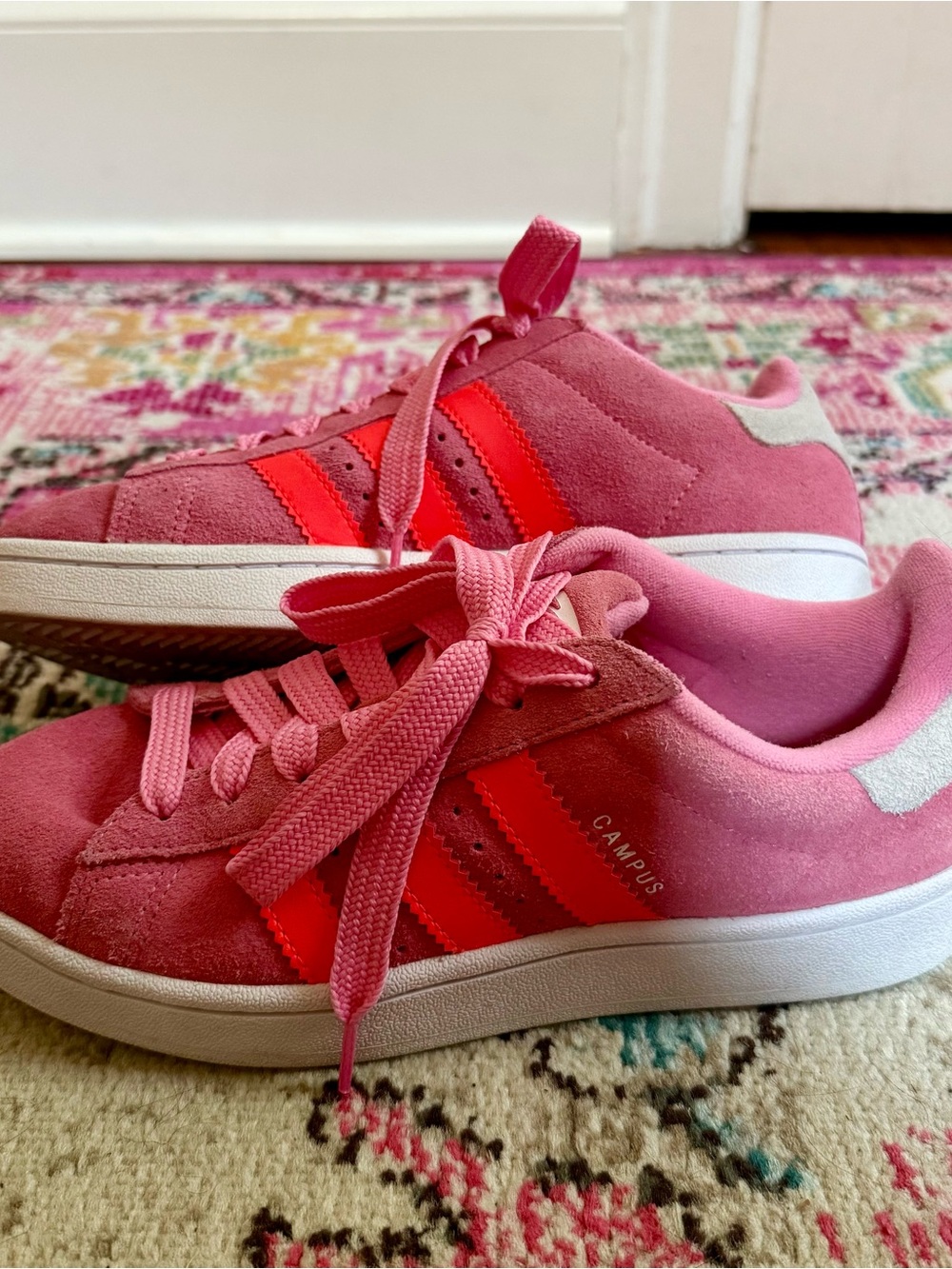 Women’s 8, Big Kids 6.5. Adidas Campus 00’s, Pink with Orange Stripes.